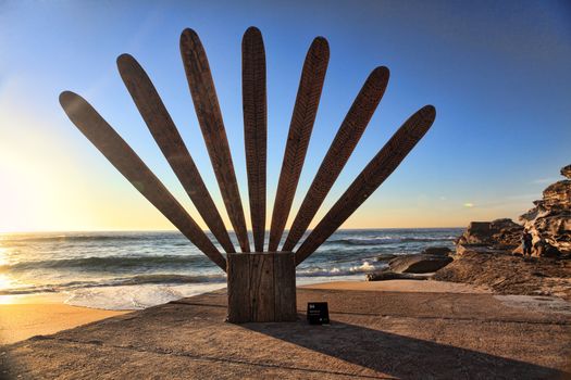 Bondi Beach, Australia - November 3,  2013: Sculpture By The Sea, Bondi 2013. Annual cultural event that showcases emerging artists from around the world  Sculpture titled 'A tale of romance' by Kathy Howlowko (VIC).  Medium reclaimed timber.  Price $6500