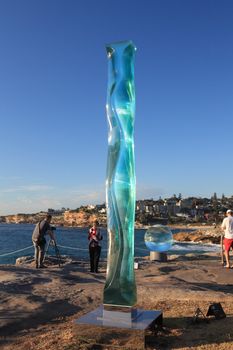 Bondi Beach, Australia - November 3,  2013: Sculpture By The Sea, Bondi 2013. Annual cultural event that showcases emerging artists from around the world  Sculpture titled 'm.130901' byToshio Lezumi (Japan).  Medium float blass.  Price $50000