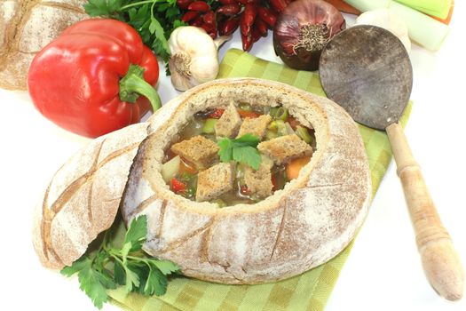 Bread soup with chilli on a light background