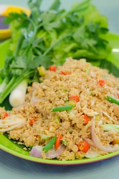 close up  fish roe with mix vegetable, served with fresh green vegetable , spicy and sour food