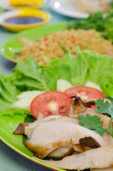 close up  sliced grilled pork  served with fresh vegetable