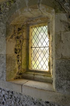 12th century Norman church window belonging to the church of St Andrew at Edburton,Sussex,England.







12th century window