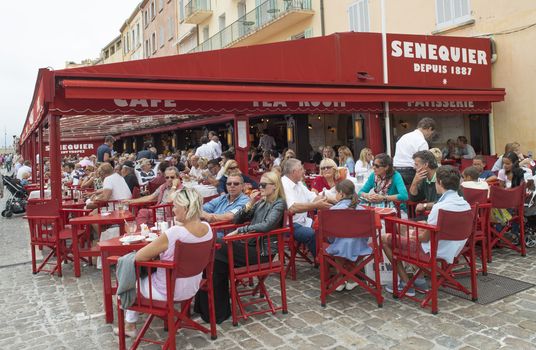 Sant-Tropez,France - October13, 2011: People eating at night oudoors in a restaurant at Montmatre