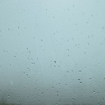 Blurry rain drops in a window