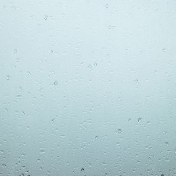 Blurry rain drops in a window