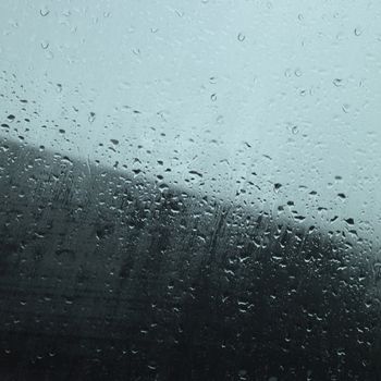 Blurry rain drops in a window