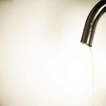 Close up of a silver tap