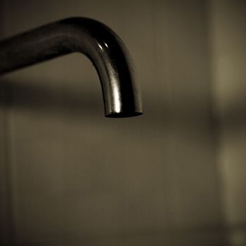 Close up of a silver tap
