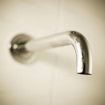 Close up of a silver tap