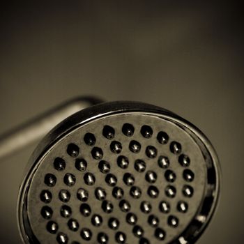 Close up of a silver shower head
