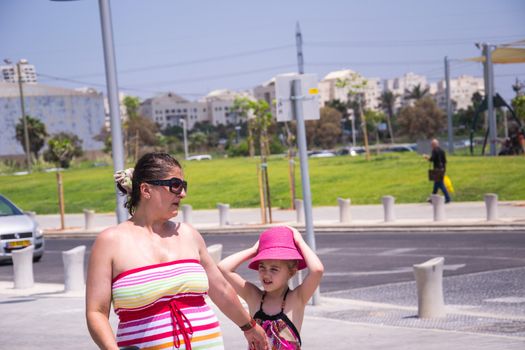 Mother and daughter walking