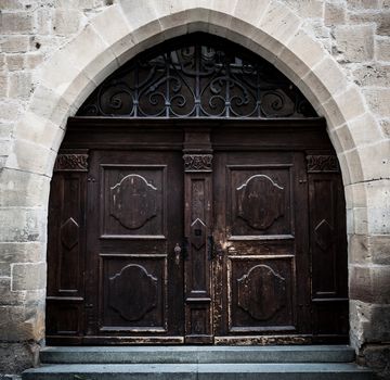 Big dark brown wooden door