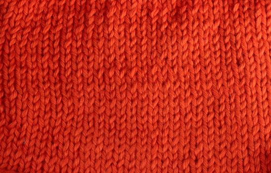 Wool knitted textured background close up