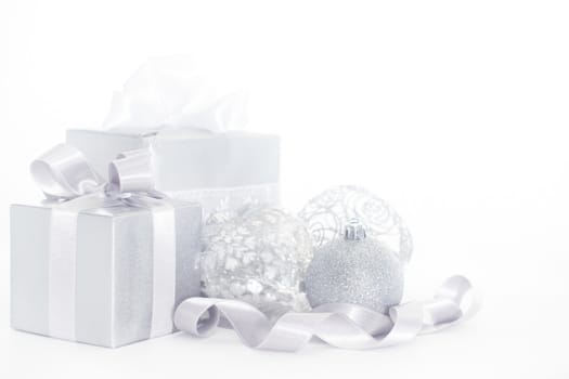 Silver christmas card with gifts and decoration