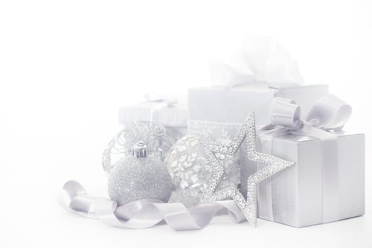 Silver christmas card with gifts and decoration