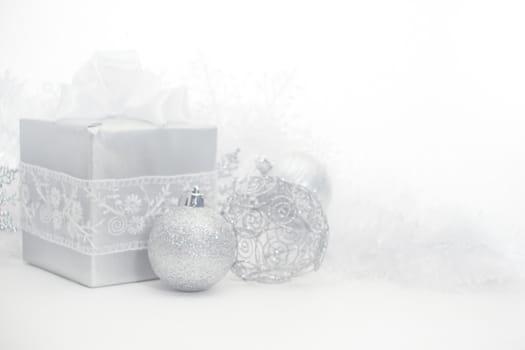 Silver christmas card with gifts and decoration