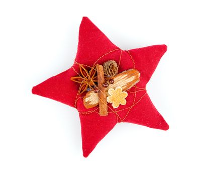 christmas star christmas spices : cinnamon sticks and star anise. on a white background