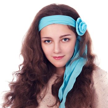 beautiful brown-haired woman with blue ribbon in her hair isolated on a white background