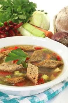 a plate with a colorful bread soup