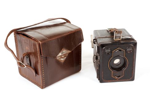 very old vintage camera isolated on white background with transporting box