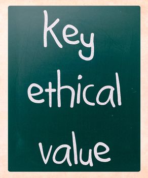 "key ethical value" handwritten with white chalk on a blackboard