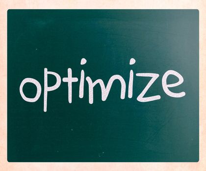"Optimize" handwritten with white chalk on a blackboard