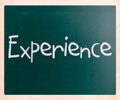 The word "Experience" handwritten with white chalk on a blackboard