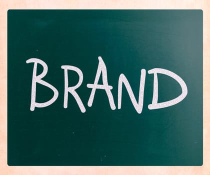 "BRAND" handwritten with white chalk on a blackboard
