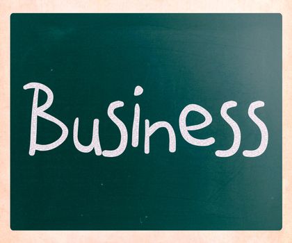The word "Business" handwritten with white chalk on a blackboard
