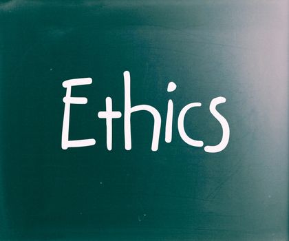 The word "Ethics" handwritten with white chalk on a blackboard