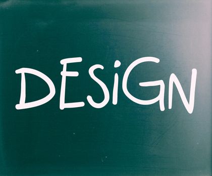 The word "Design" handwritten with white chalk on a blackboard