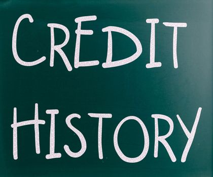 "Credit history" handwritten with white chalk on a blackboard