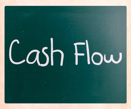 "Cash flow" handwritten with white chalk on a blackboard