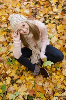 attractive young woman relaxing in atumn park outdoor nature yellow