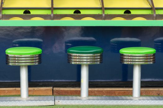 3 Stools shot in a Amusement park