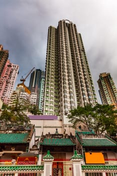 Man Mo Temple Apartment Buildings Hollywood Road Hong Kong Island China. Temple was built in 1847 and is one of the oldest temple on Hong Kong Island.  Man Tai is the literature god.