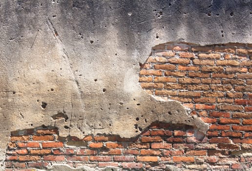 Decayed, cracked concrete vintage brick wall background.