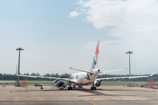 SINGAPORE - SEP 11: Jetstar airways plane stands in Changi airport on SEP 11, 2012  in Singapore. Jetstar Airways is an Australian low-cost airline headquartered in Melbourne.