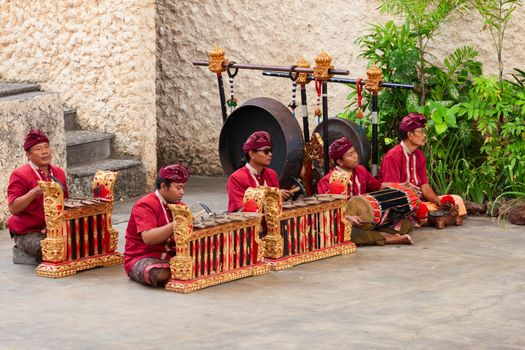 BALI, INDONESIA - SEP 13: Musicians in the traditional Balinese performance in Garuda Wisnu Kencana Cultural Park (GWK) on Sep 13, 2012  in Bali, Indonesia. GWK is a popular tourist attraction on Bali.