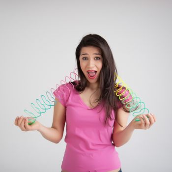 beautiful woman with a toy rainbow