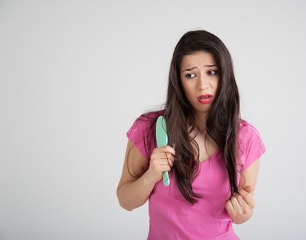 woman concerned about the condition of the hair