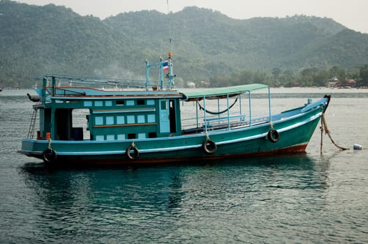  Green fishing boat in Thailand