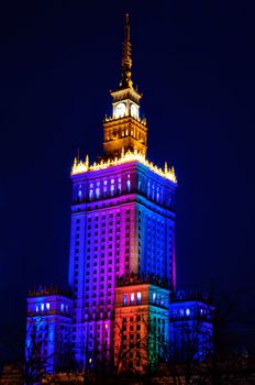 Illuminated Palace of Culture and Science at night. Warsaw, Poland 