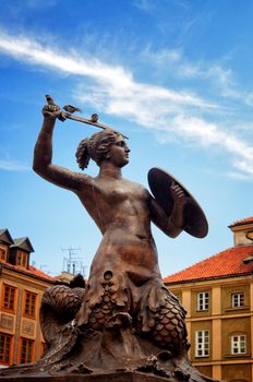 Siren Monument over blue sky, Old Town in Warsaw, Poland 