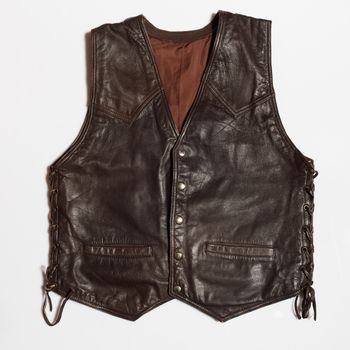 Vintage biker man's leather waistcoat on a white background