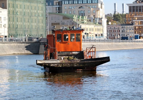 The ship clears the river of debris