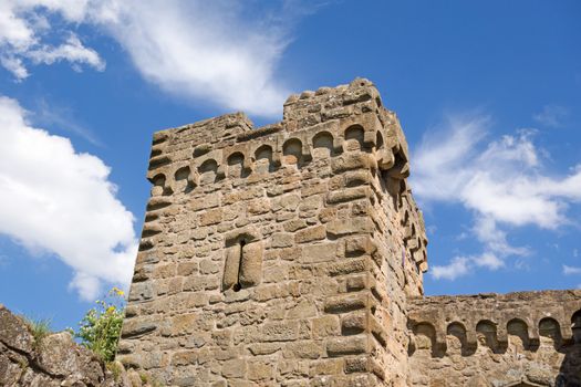 Castle tower on blue sky