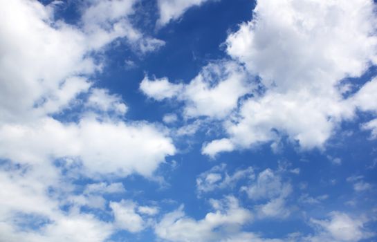 White fluffy clouds in the blue sky