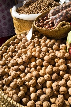 Heaps of nuts on a traditional street market stall