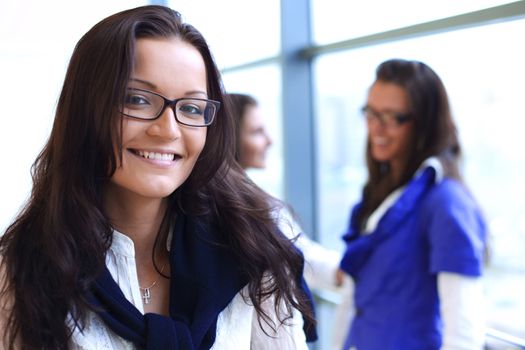 Student meeting smiley girl face on foreground 